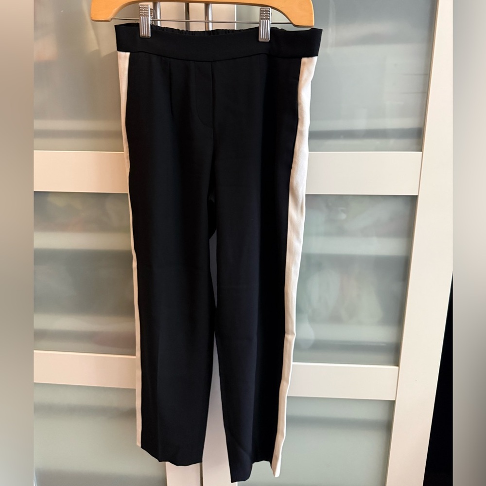 Babaton Black Top with Subtle White Label Detail